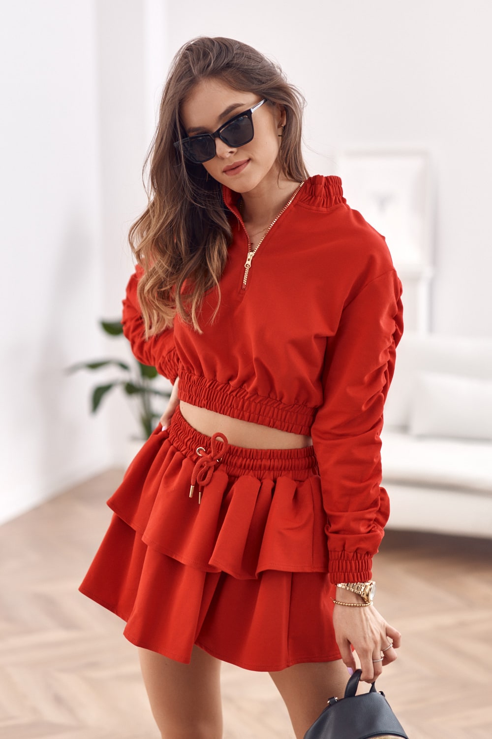 A tracksuit, a skirt, a red sweatshirt FI609